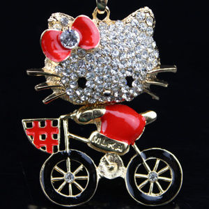 -Red Kitty riding a Bike Pendant